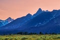 The mountains and luxuriant plants in the setting sun